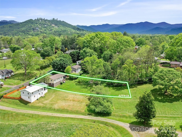 92 Church St, Weaverville, NC 28787 - aerial overview of property's location with a mountain backdrop and property parcel outlined