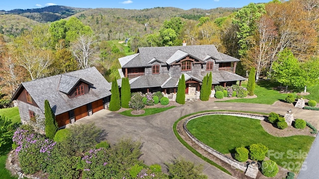 693 Thunderhill Trl, Blowing Rock, NC 28605 - view of subject property featuring a forest and a mountainous background