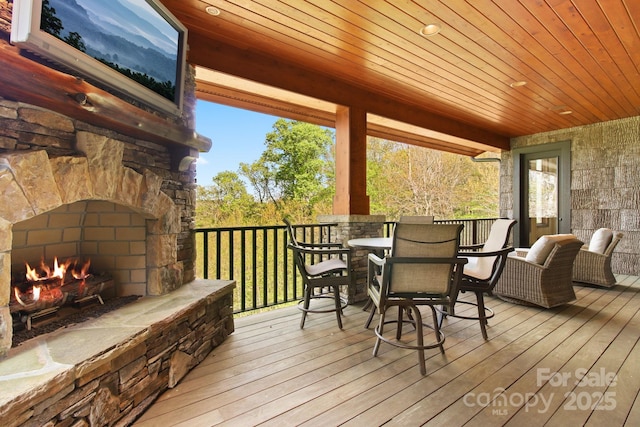 693 Thunderhill Trl, Blowing Rock, NC 28605 - wooden deck featuring an outdoor stone fireplace