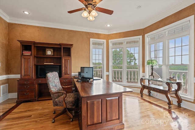 office space with light wood-style flooring, a ceiling fan, ornamental molding, baseboards, and recessed lighting