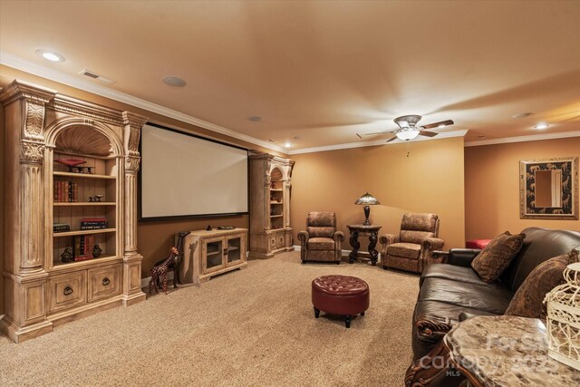 cinema room featuring carpet, ceiling fan, crown molding, and recessed lighting