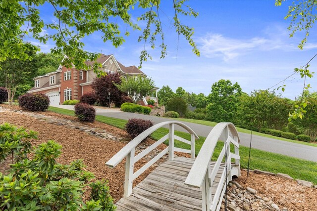 view of property's community featuring an attached garage