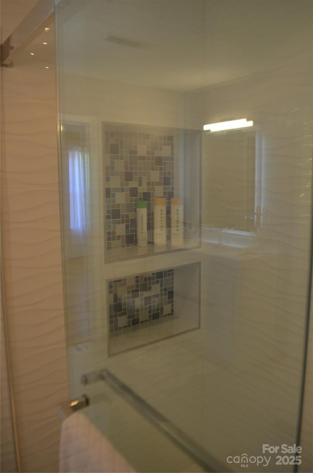 bathroom with a shower