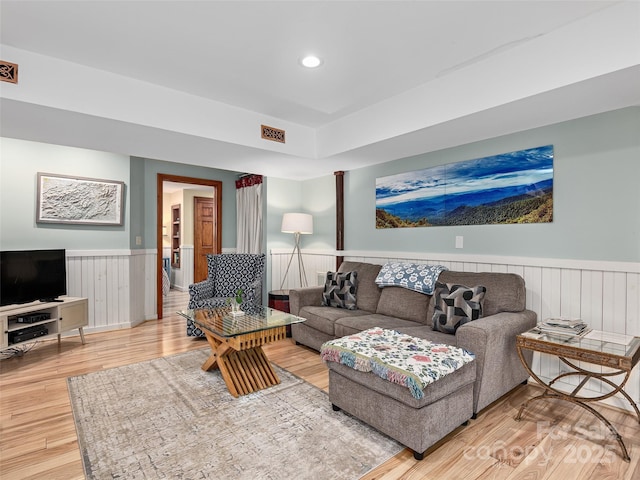 221 Holland Dr, Black Mountain, NC 28711 - living area with recessed lighting, visible vents, wainscoting, and light wood-type flooring