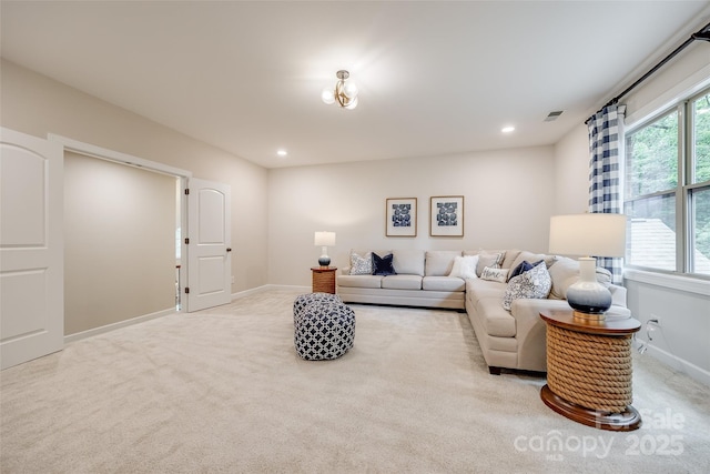 living room featuring carpet, baseboards, and recessed lighting