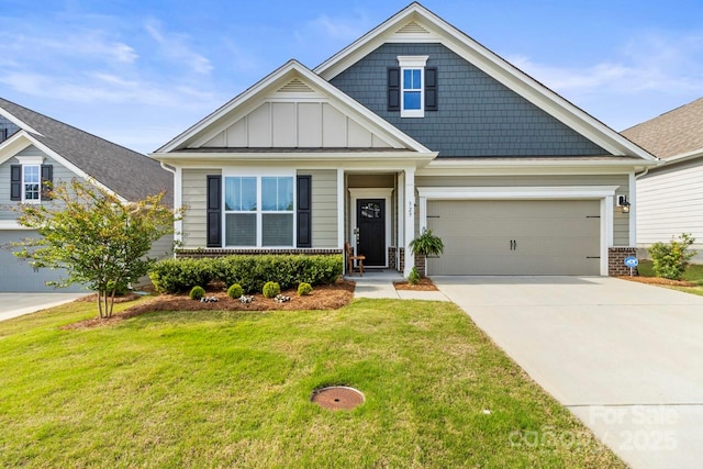 craftsman-style home with board and batten siding, concrete driveway, a front lawn, and brick siding