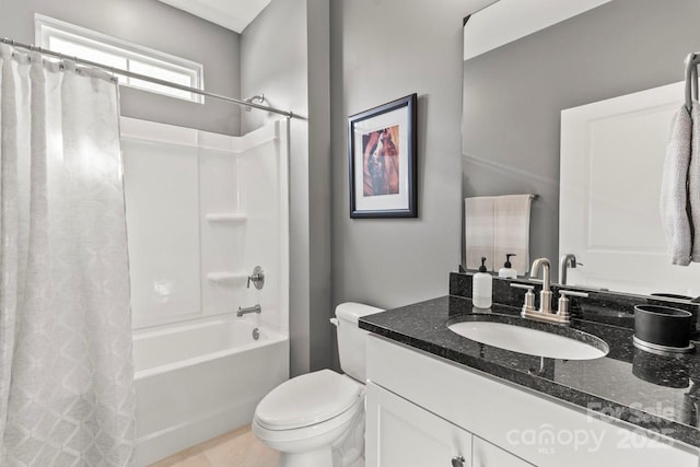 full bath with vanity, shower / bath combination with curtain, and toilet