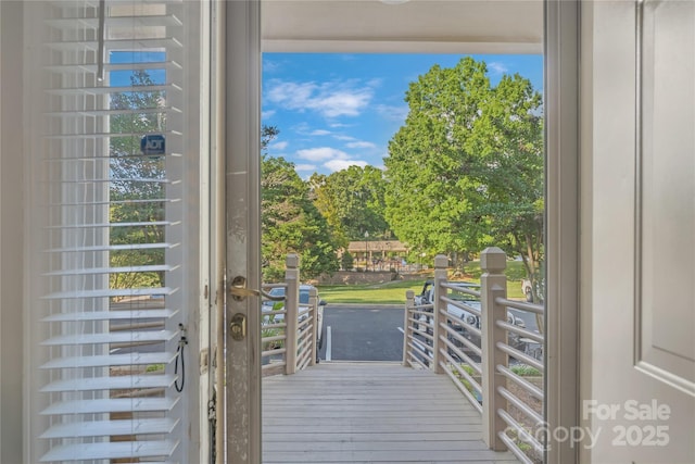 13932 Queens Harbor Rd, Charlotte, NC 28278 - doorway to outside with hardwood / wood-style floors