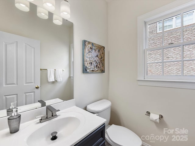 half bath with toilet and vanity