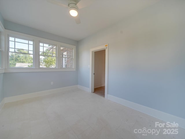 300 W Thomas St, Salisbury, NC 28144 - spare room featuring ceiling fan and baseboards