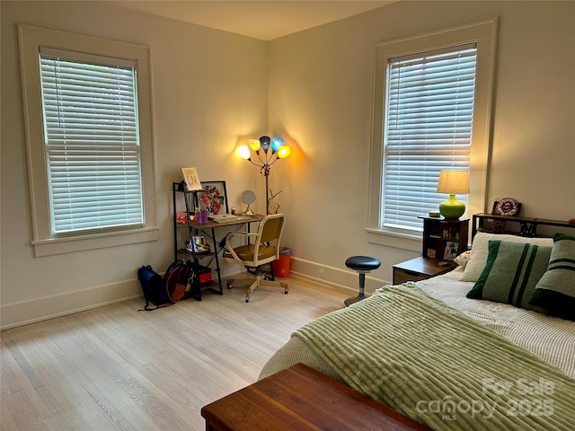 300 W Thomas St, Salisbury, NC 28144 - bedroom featuring baseboards and wood finished floors
