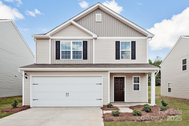 view of front facade featuring board and batten siding, an attached garage, concrete driveway, and a porch