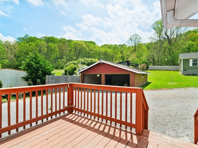 819 Mauney Cove Rd, Waynesville, NC 28786 - wooden terrace with fence, a detached garage, an outdoor structure, and a yard