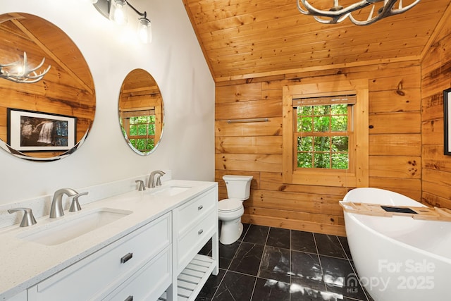 1415 Little River Campground Rd, Pisgah Forest, NC 28768 - bathroom featuring vaulted ceiling, wood walls, a soaking tub, double vanity, and wooden ceiling