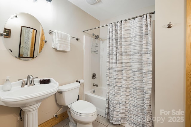 1415 Little River Campground Rd, Pisgah Forest, NC 28768 - bathroom with toilet, shower / bath combination with curtain, and tile patterned floors