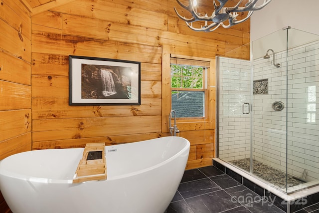 1415 Little River Campground Rd, Pisgah Forest, NC 28768 - full bathroom with wooden walls, a chandelier, a stall shower, and a soaking tub