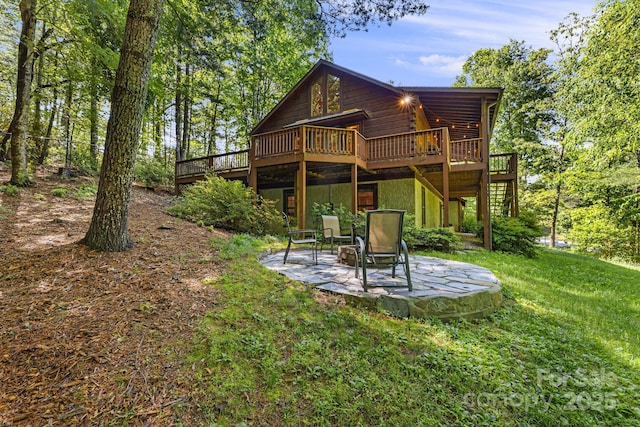 1415 Little River Campground Rd, Pisgah Forest, NC 28768 - back of house featuring a patio area, a deck, and a lawn