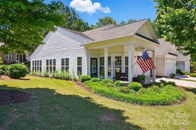 9003 Smokey Hill Ln, Fort Mill, SC 29707 - rear view of house featuring a lawn, a shingled roof, french doors, and a garage