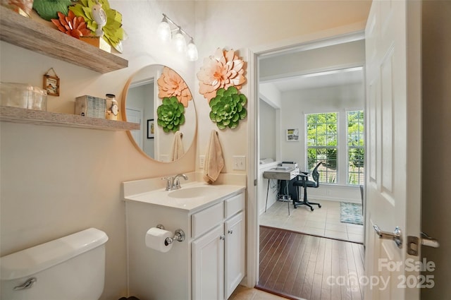 9003 Smokey Hill Ln, Fort Mill, SC 29707 - bathroom featuring toilet, vanity, and wood finished floors