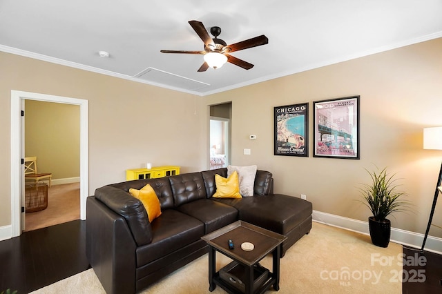 9735 Wheatfield Rd, Charlotte, NC 28277 - living room featuring a ceiling fan, crown molding, baseboards, light carpet, and attic access