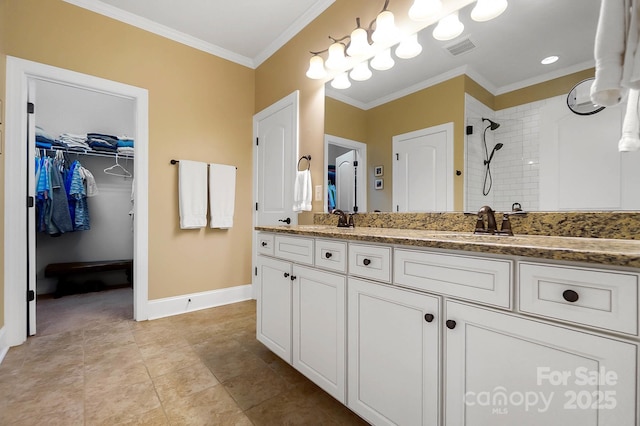 9735 Wheatfield Rd, Charlotte, NC 28277 - full bath featuring a tile shower, a spacious closet, baseboards, ornamental molding, and double vanity