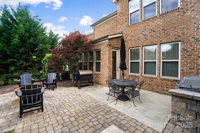 9735 Wheatfield Rd, Charlotte, NC 28277 - view of patio / terrace featuring outdoor dining space, grilling area, and area for grilling