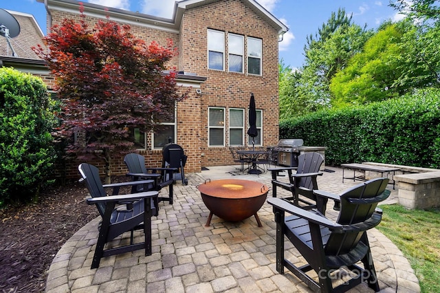 9735 Wheatfield Rd, Charlotte, NC 28277 - view of patio / terrace with a fire pit, grilling area, and outdoor dining area