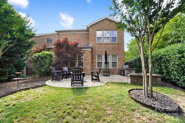 9735 Wheatfield Rd, Charlotte, NC 28277 - back of house featuring brick siding and a patio