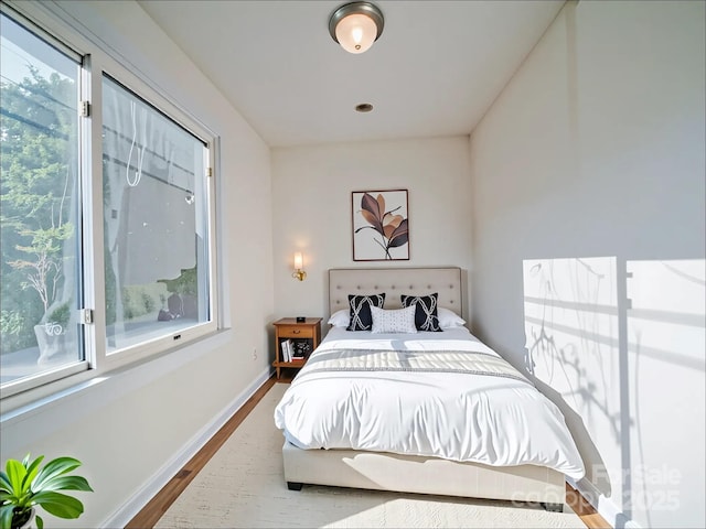 55 Ranlo Ave, Gastonia, NC 28054 - bedroom with baseboards and dark wood-style floors