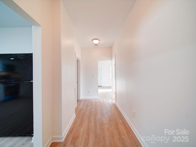 55 Ranlo Ave, Gastonia, NC 28054 - hallway with baseboards and light wood-type flooring