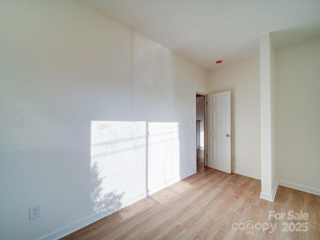 55 Ranlo Ave, Gastonia, NC 28054 - spare room with baseboards and wood finished floors