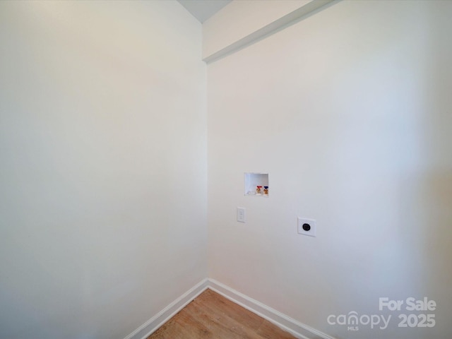 55 Ranlo Ave, Gastonia, NC 28054 - clothes washing area with washer hookup, hookup for an electric dryer, laundry area, baseboards, and light wood-style floors