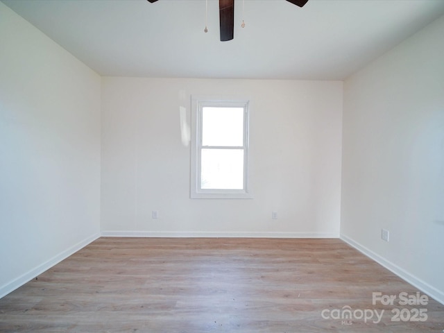 55 Ranlo Ave, Gastonia, NC 28054 - spare room featuring baseboards, ceiling fan, and wood finished floors