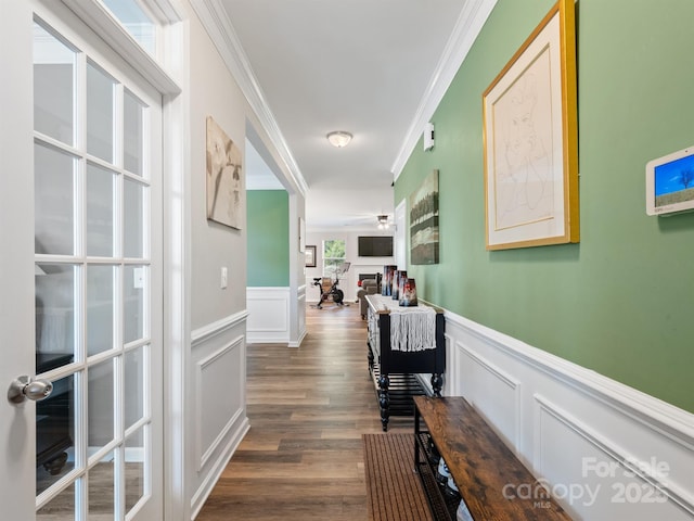 4316 Falls Lake Dr SW, Concord, NC 28025 - corridor with ornamental molding, a wainscoted wall, a decorative wall, and dark wood-type flooring