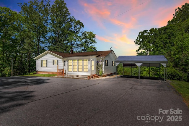 2196 Uphill Ln, Lenoir, NC 28645 - view of front facade with a detached carport and driveway