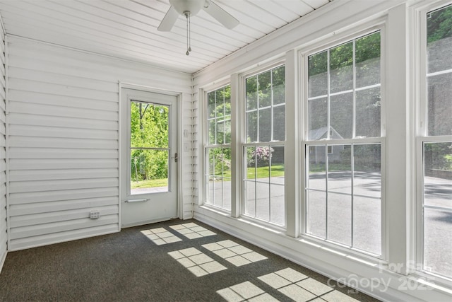 2196 Uphill Ln, Lenoir, NC 28645 - unfurnished sunroom with a ceiling fan and carpet
