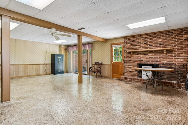 2196 Uphill Ln, Lenoir, NC 28645 - miscellaneous room with a paneled ceiling, a ceiling fan, wainscoting, baseboards, and wallpapered walls