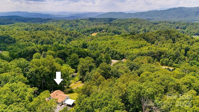 2196 Uphill Ln, Lenoir, NC 28645 - drone / aerial view of a heavily wooded area and a mountainous background