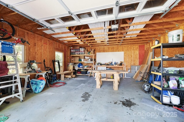 44 White Thorn Dr, Alexander, NC 28701 - garage with a workshop area and a garage door opener