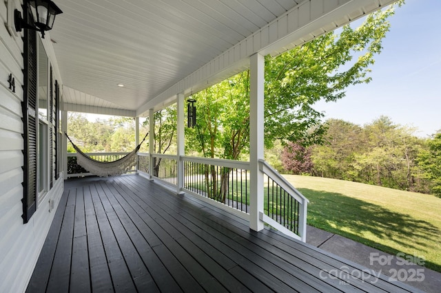44 White Thorn Dr, Alexander, NC 28701 - wooden deck featuring covered porch and a yard