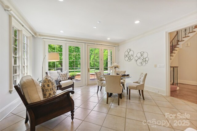 5701 Challisford Ln, Charlotte, NC 28226 - dining space with stairway, baseboards, ornamental molding, and recessed lighting