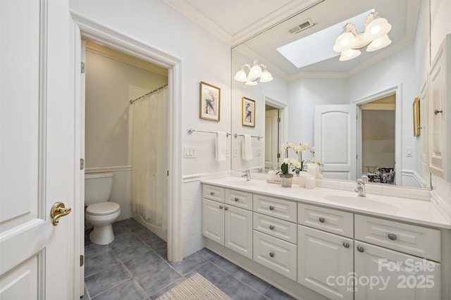 5701 Challisford Ln, Charlotte, NC 28226 - full bathroom featuring a skylight, crown molding, visible vents, and a sink