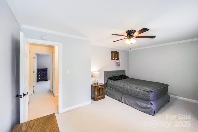 6910 Birdsong Ln, Waxhaw, NC 28173 - bedroom with carpet floors, ornamental molding, baseboards, and a ceiling fan