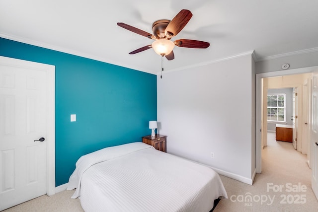 6910 Birdsong Ln, Waxhaw, NC 28173 - bedroom with ornamental molding, light carpet, baseboards, and a ceiling fan