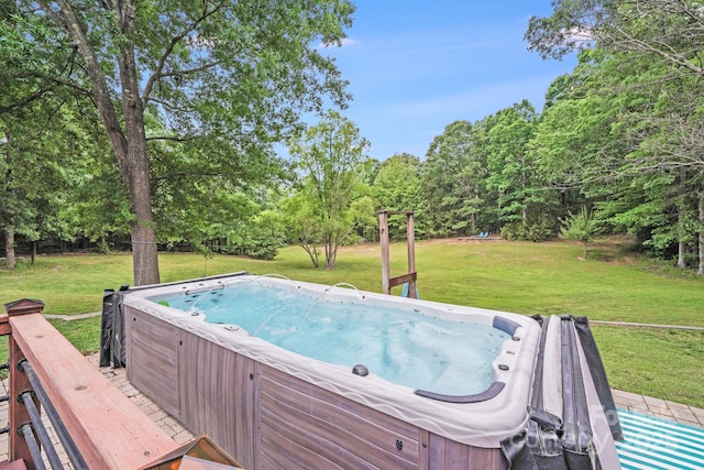 6910 Birdsong Ln, Waxhaw, NC 28173 - view of pool featuring a hot tub, a lawn, and view of scattered trees