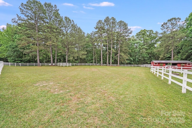 6910 Birdsong Ln, Waxhaw, NC 28173 - view of yard with an outbuilding and a forest view