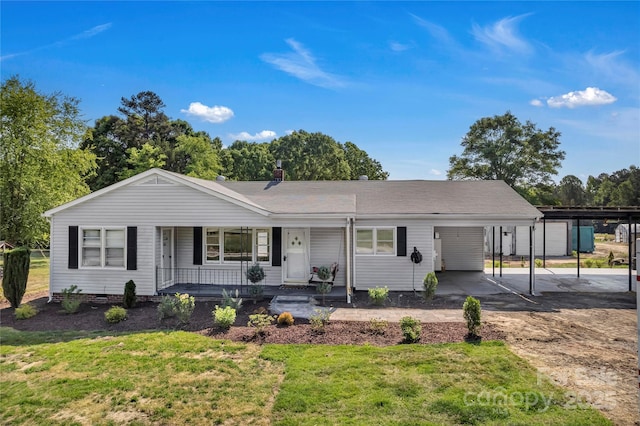 159 Old Home Pl, China Grove, NC 28023 - ranch-style house featuring a porch, a front lawn, and a carport