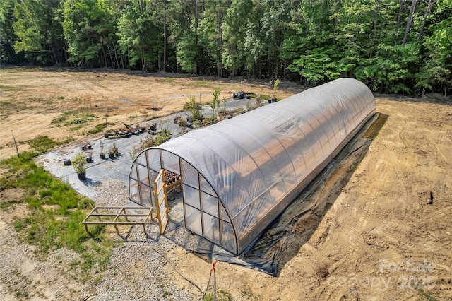 159 Old Home Pl, China Grove, NC 28023 - details featuring a view of trees and a greenhouse