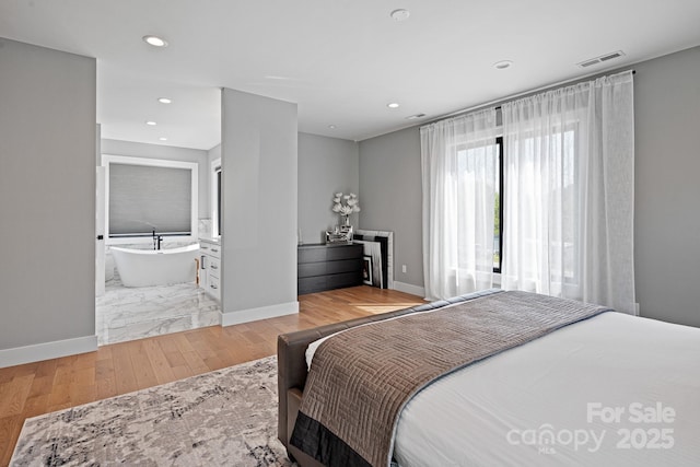 bedroom with visible vents, recessed lighting, baseboards, and light wood-type flooring