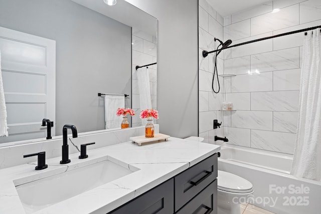 full bathroom featuring shower / bath combo with shower curtain, toilet, and vanity